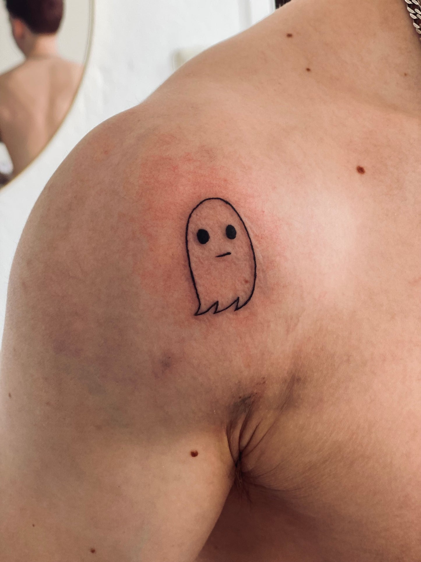 spooky ghost tattoo