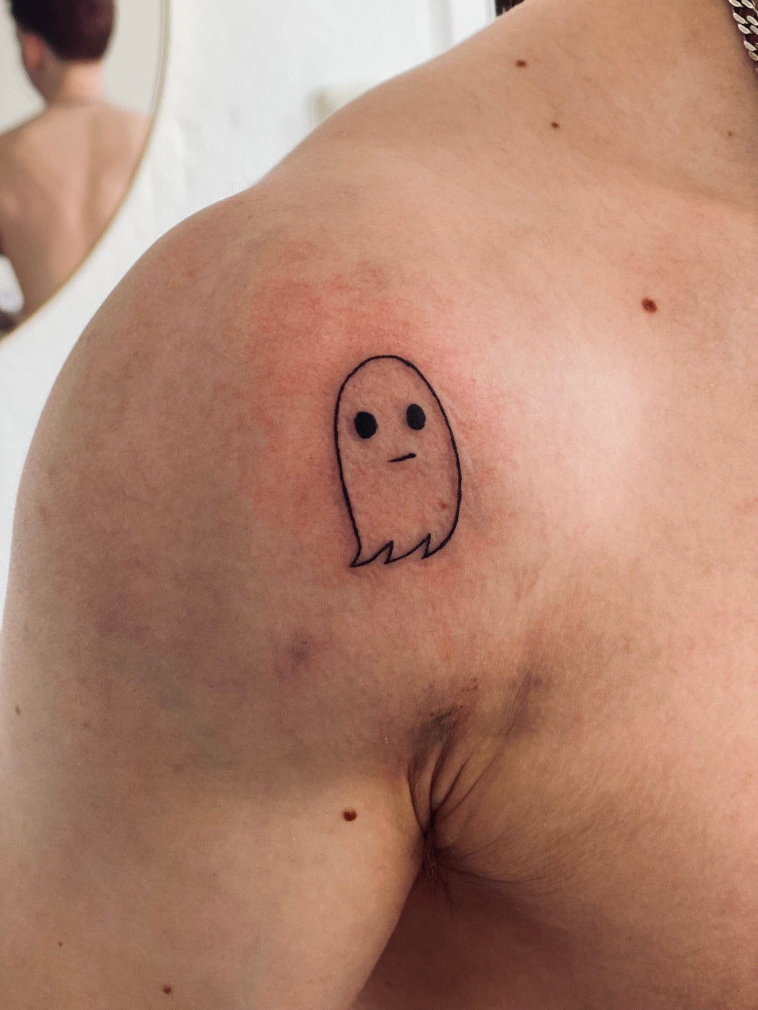 spooky ghost tattoo
